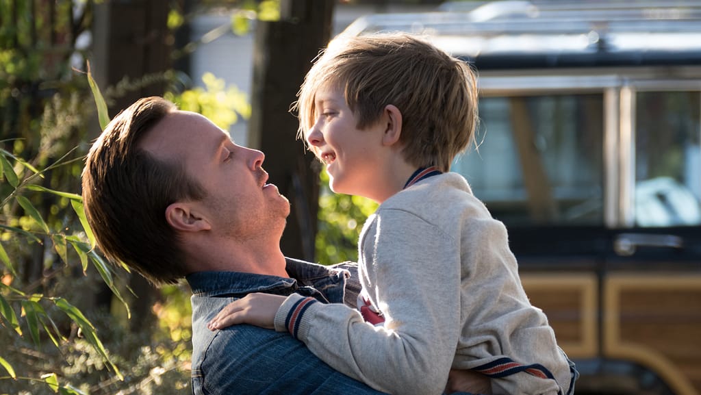Peter Drax (Aaron Paul, left) and Louis Drax (Aiden Longworth, right) in THE 9TH LIFE OF LOUIS DRAX. Photo credit: Summit Premiere.