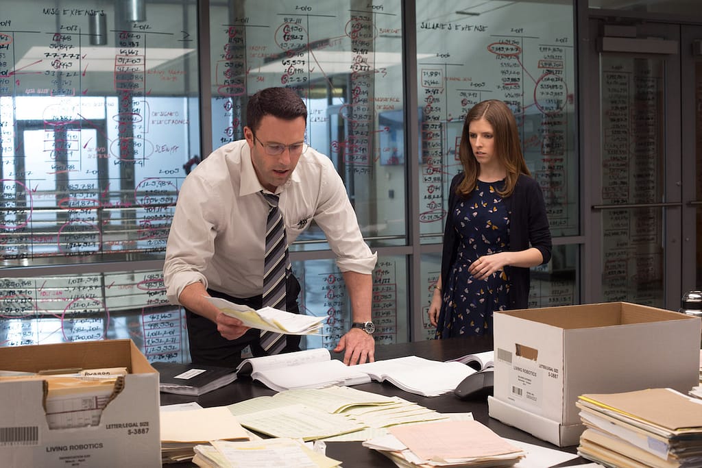 (L-r) BEN AFFLECK as Christian Wolff and ANNA KENDRICK as Dana Cummings in Warner Bros. Pictures’ “THE ACCOUNTANT,” a Warner Bros. Pictures release. Photo by Chuck Zlotnick